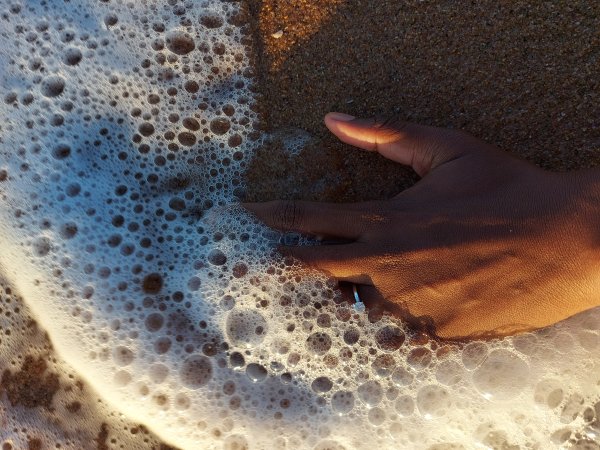 Engagement ring by the beach