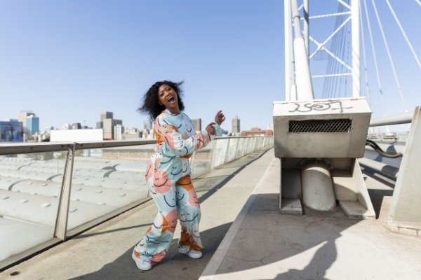 Black woman in the city smiling