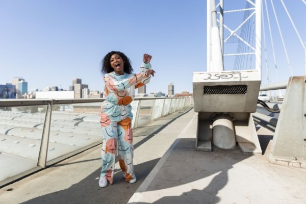 Black woman in the city smiling