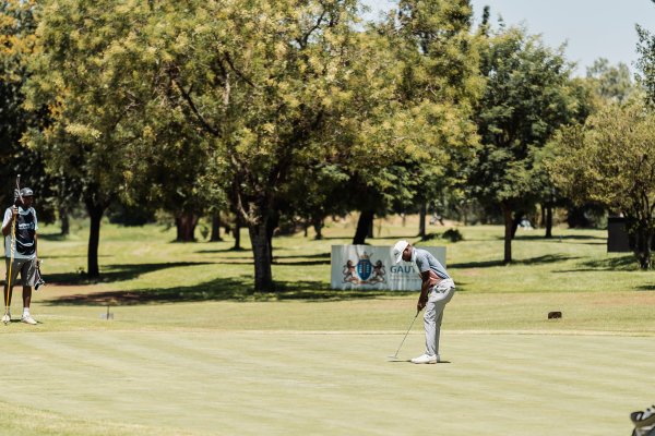 Black golfer putting on the green - Sunshine Tour 10
