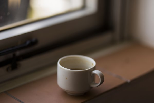 Coffee mug by a window