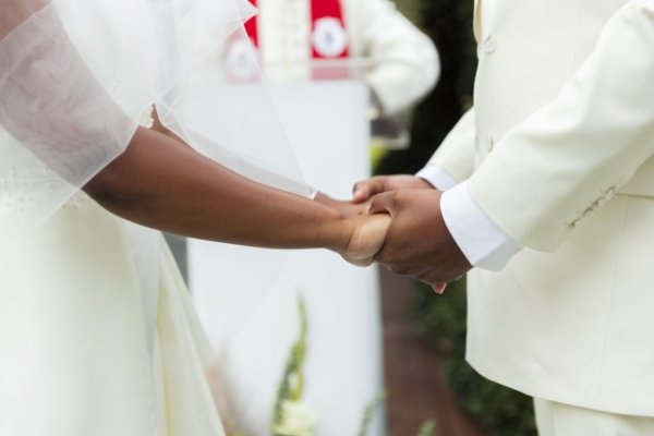 Couple holding hands