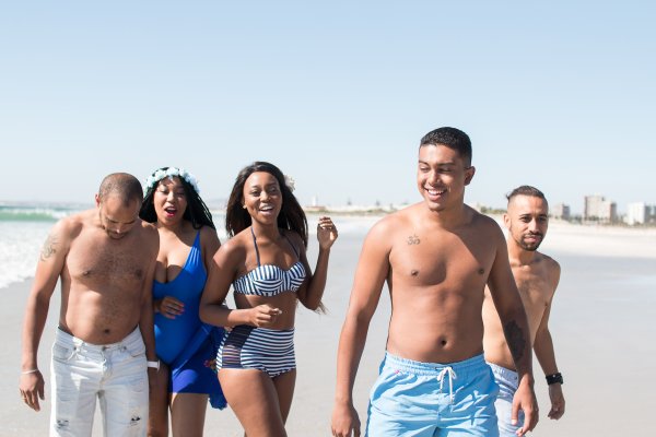 Friends at the beach having fun