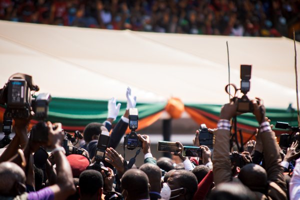Media Swarm At Political Event