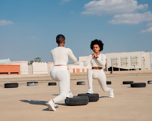 Two black women training