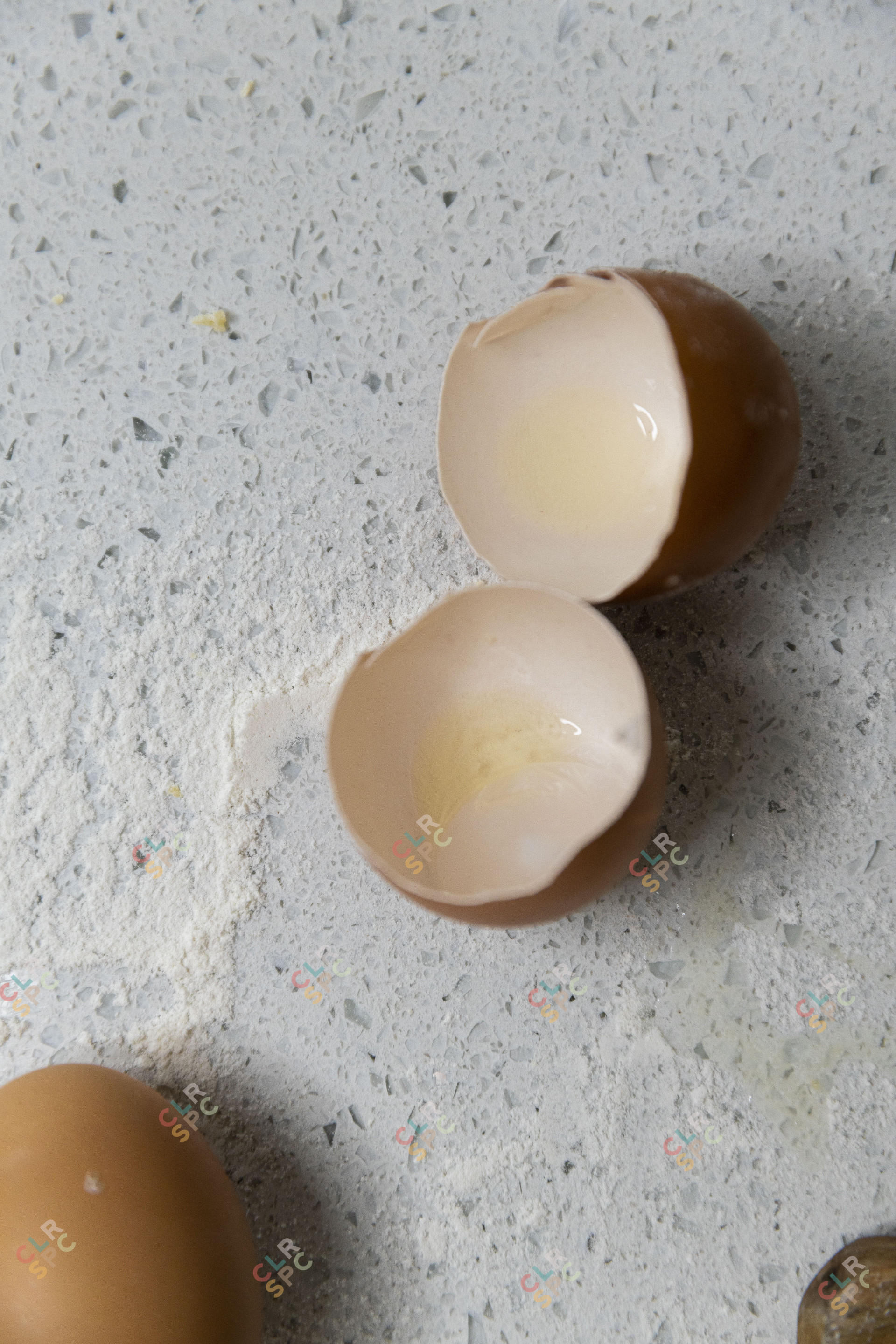 Egg shells on a table with flour