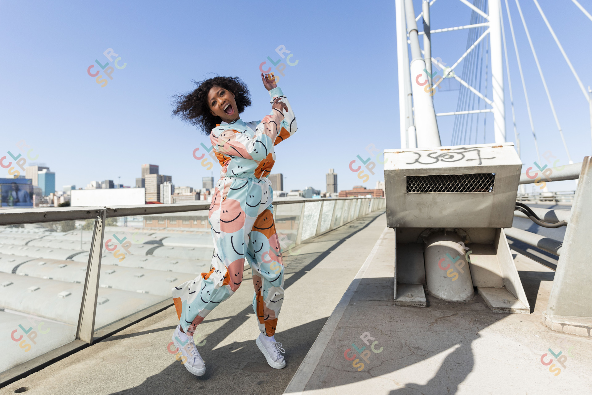 Black woman jumping for joy