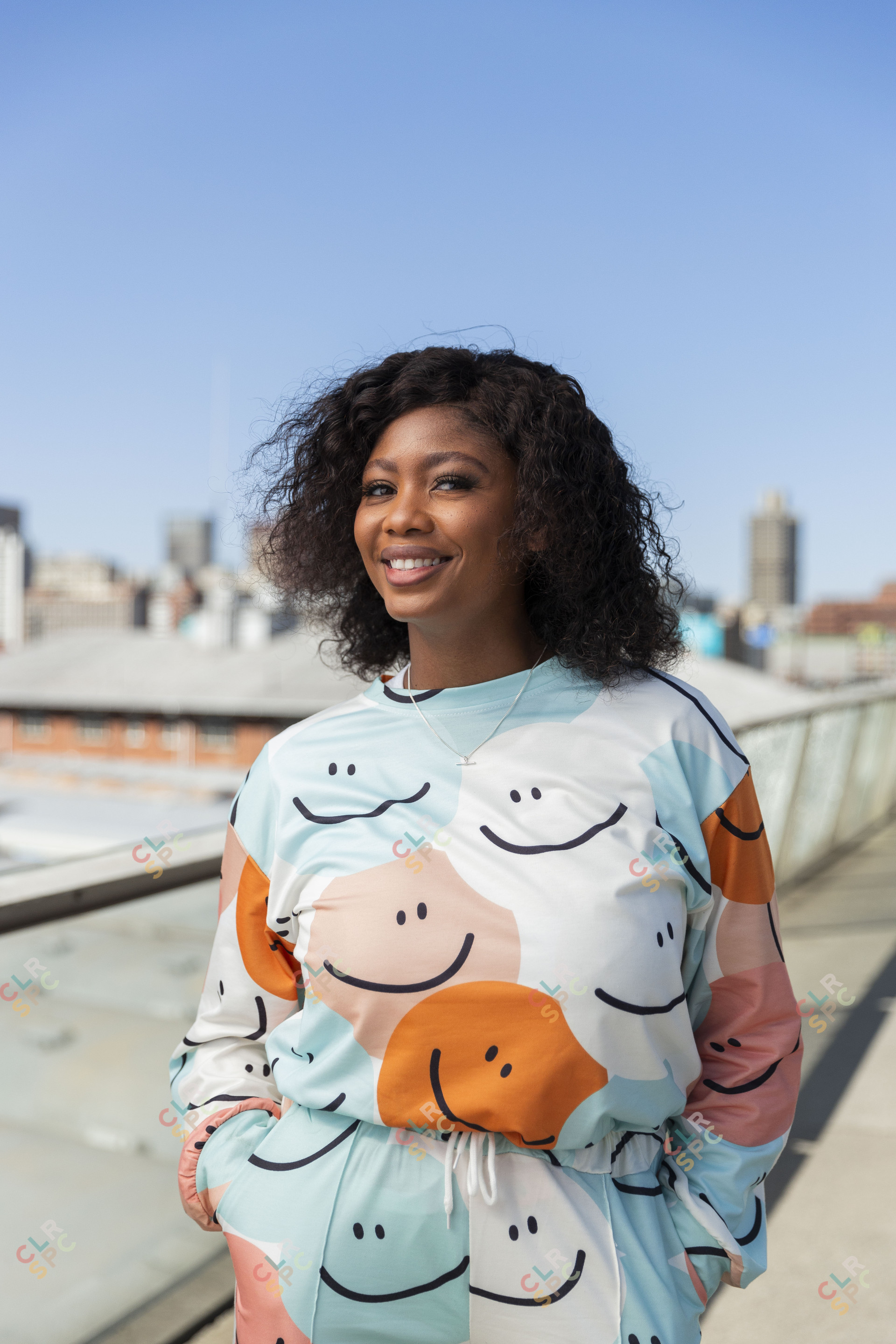 Black woman smiling on Nelson Mandela bridge
