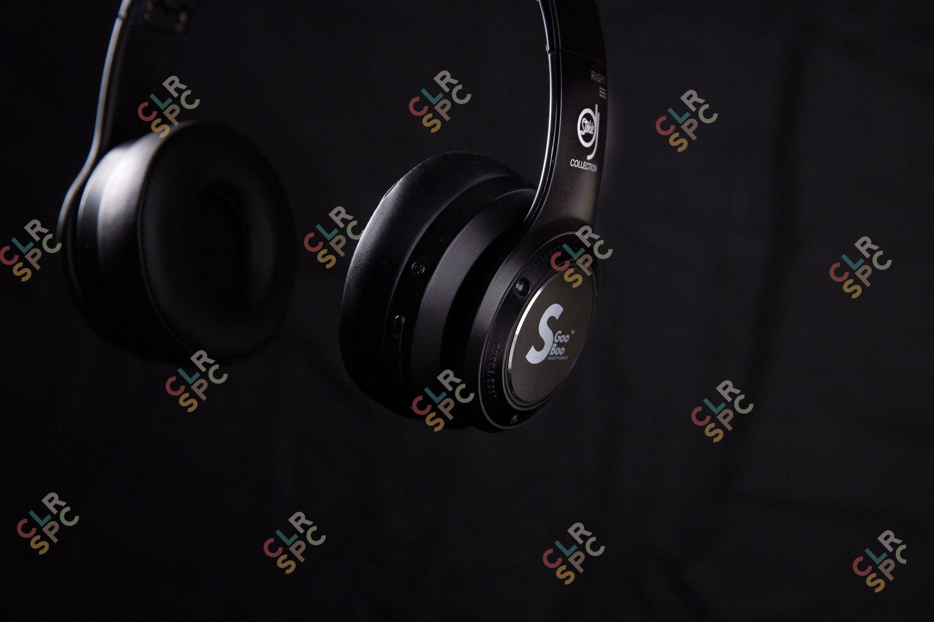 Headphones on a black backdrop