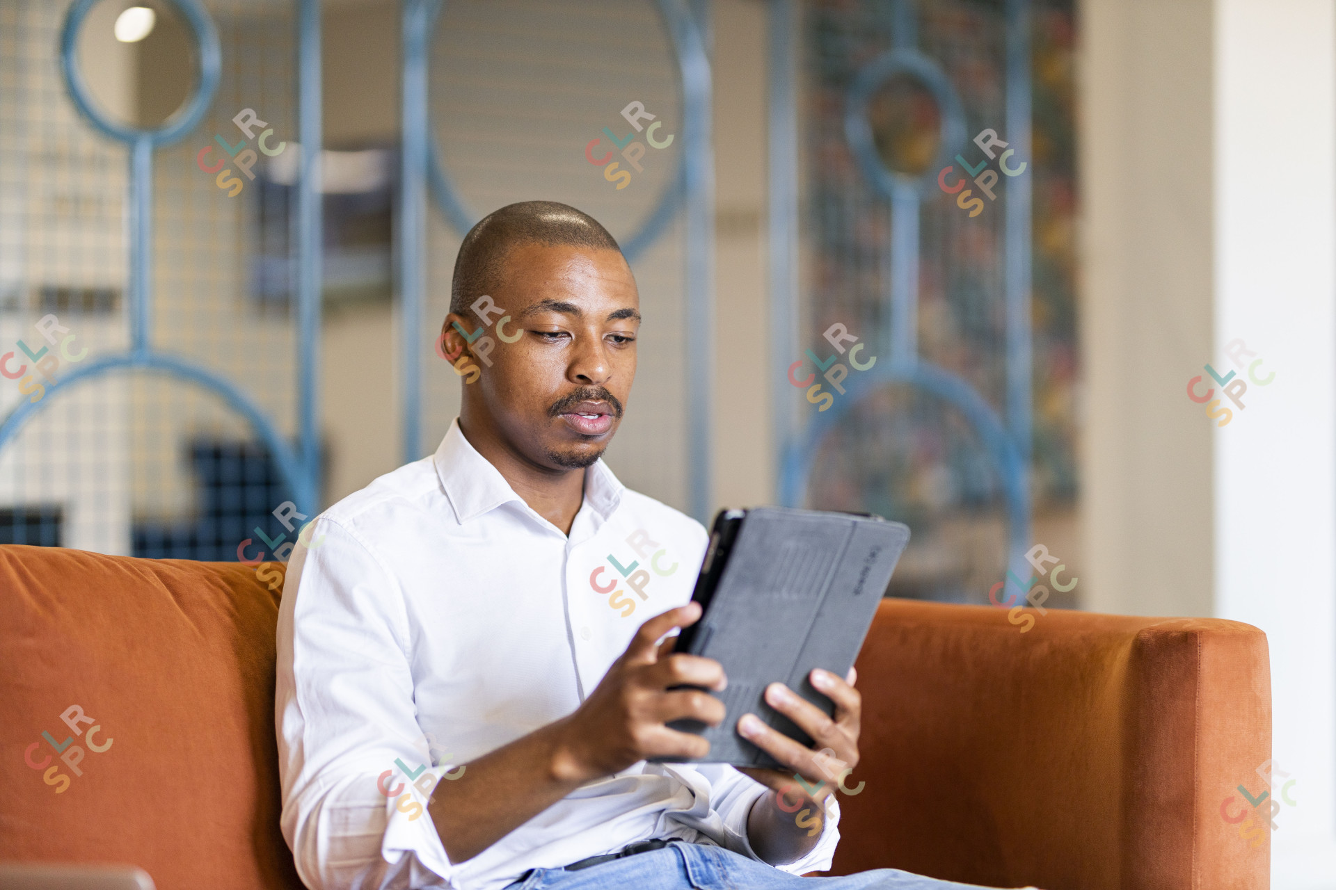 Black business man working on ipad