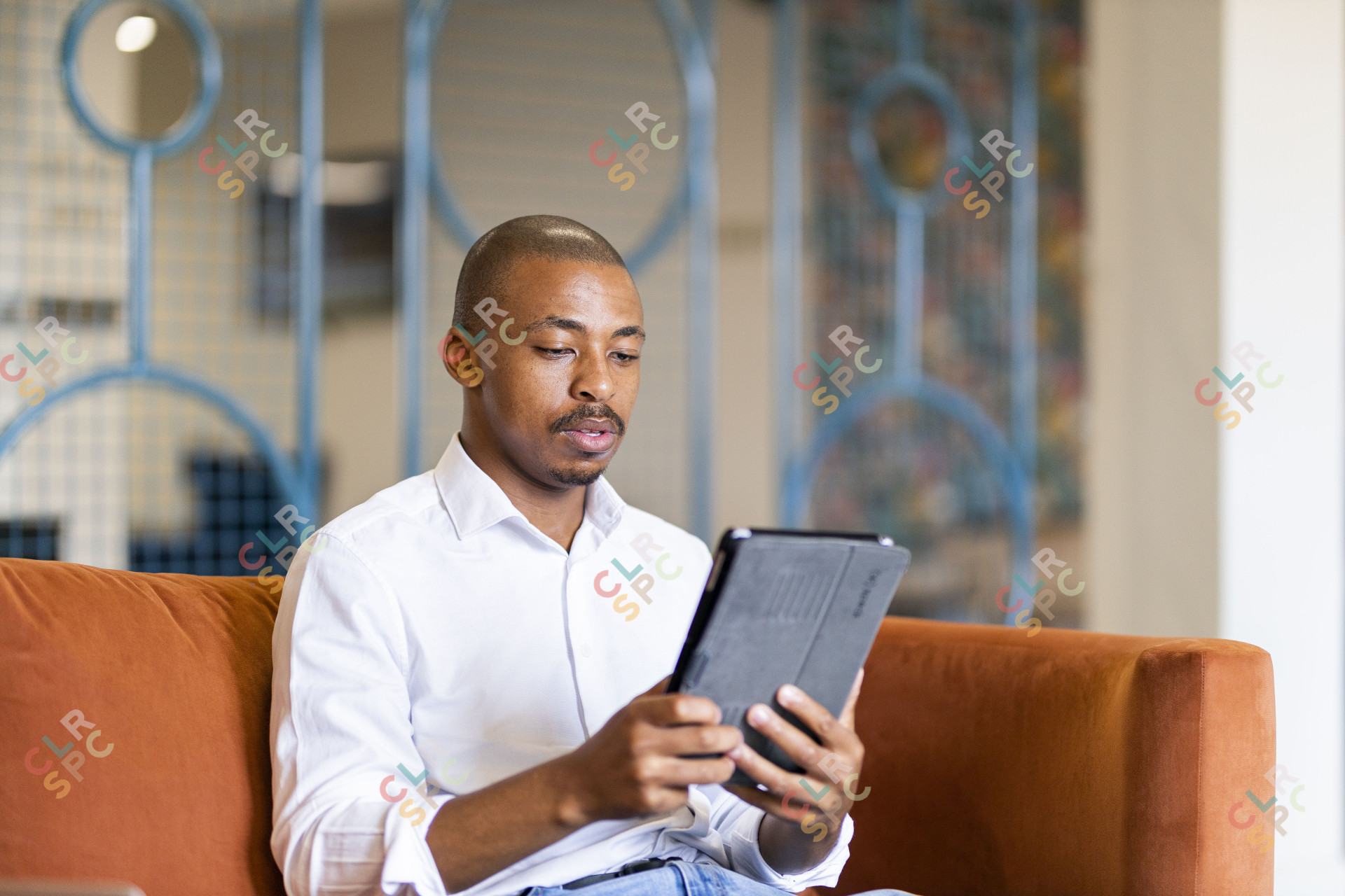 Black business man working on ipad