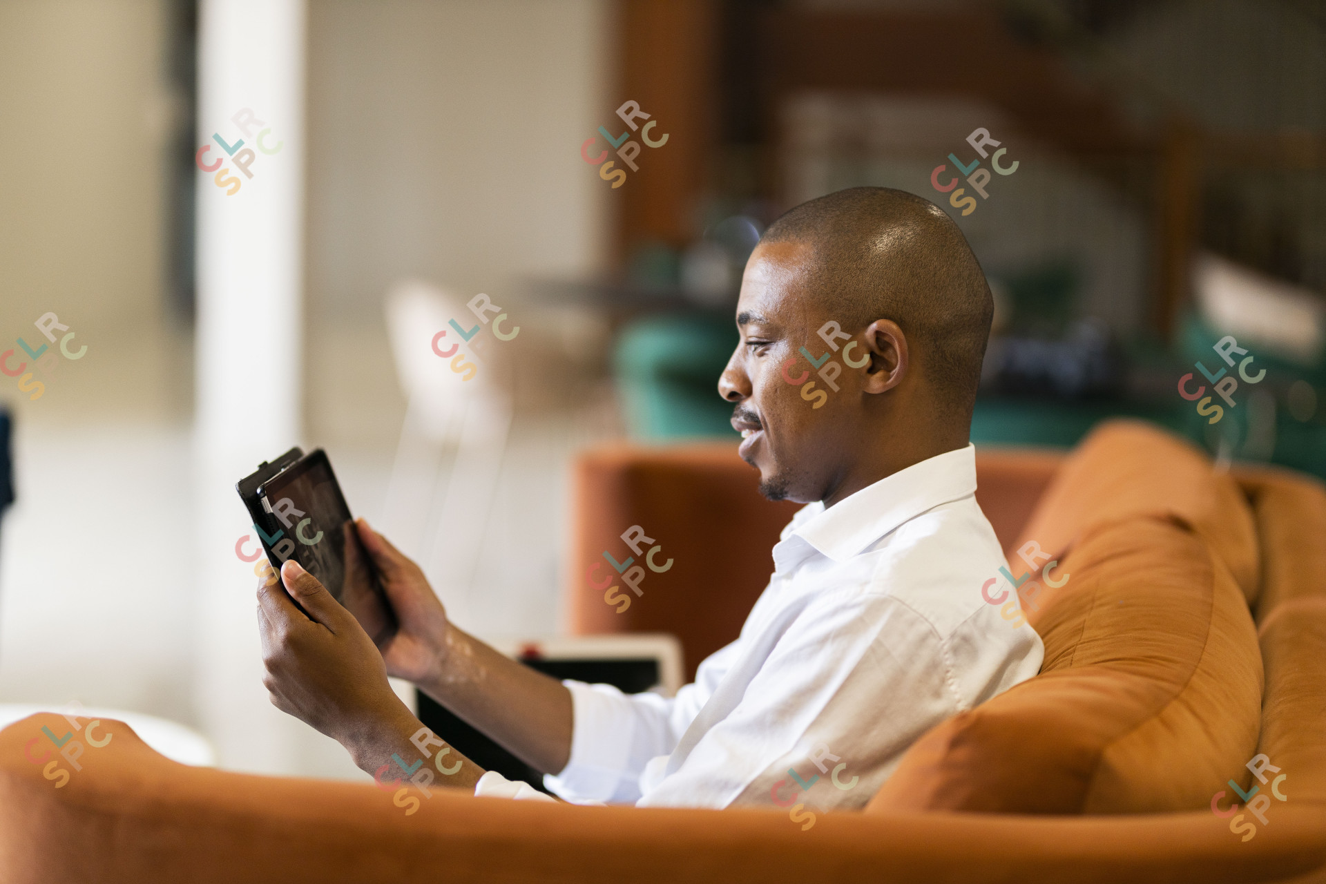 Black man working on ipad