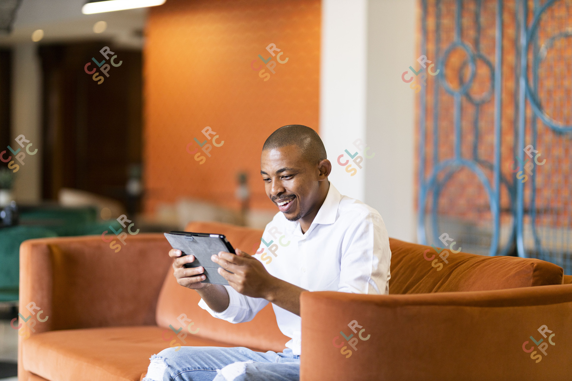 Black man working on ipad