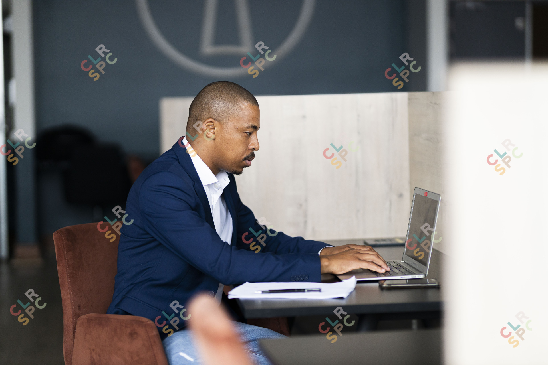 Black business man working on his laptop at work