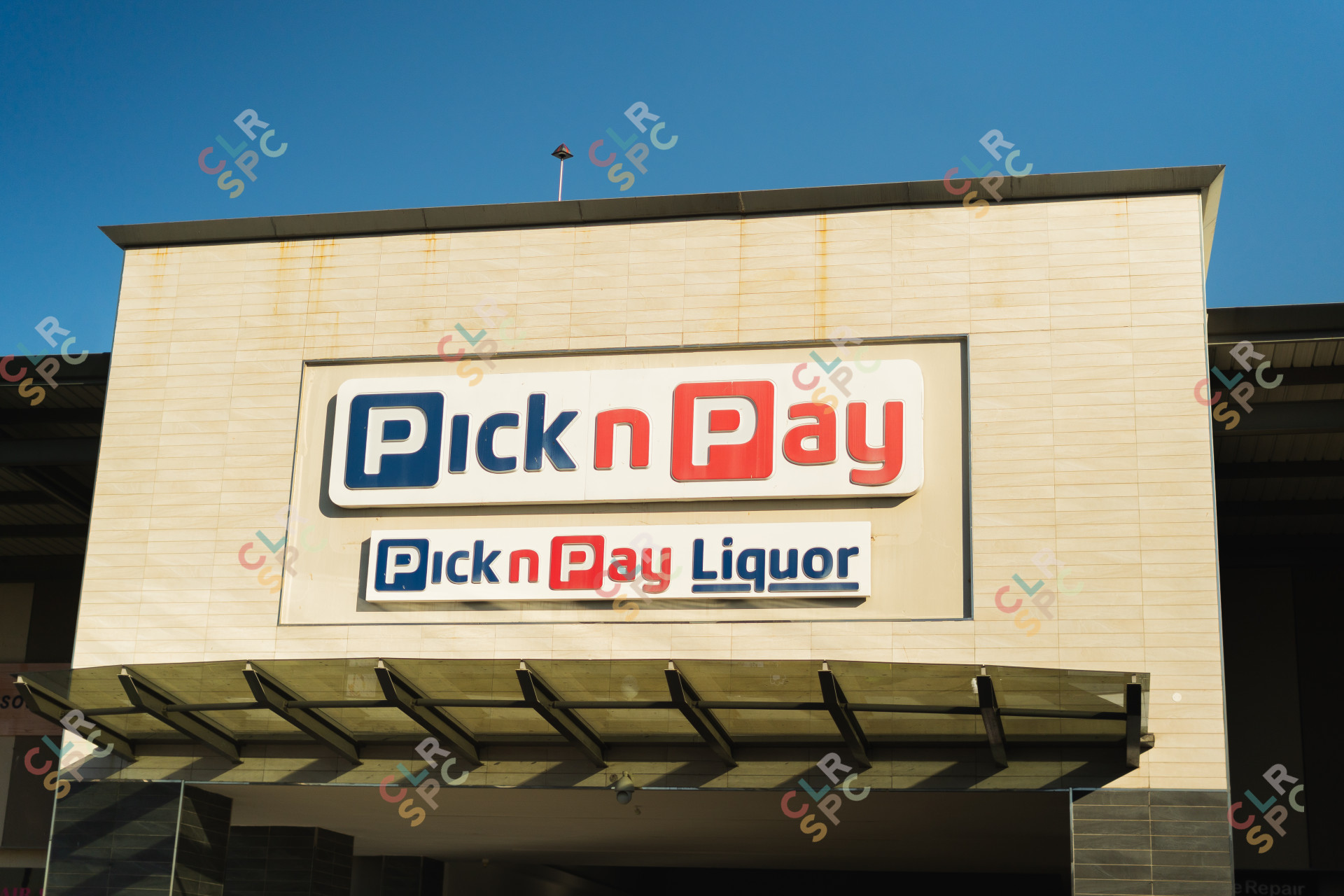 Pick n Pay sign on top on Pick n Pay Liquor sign