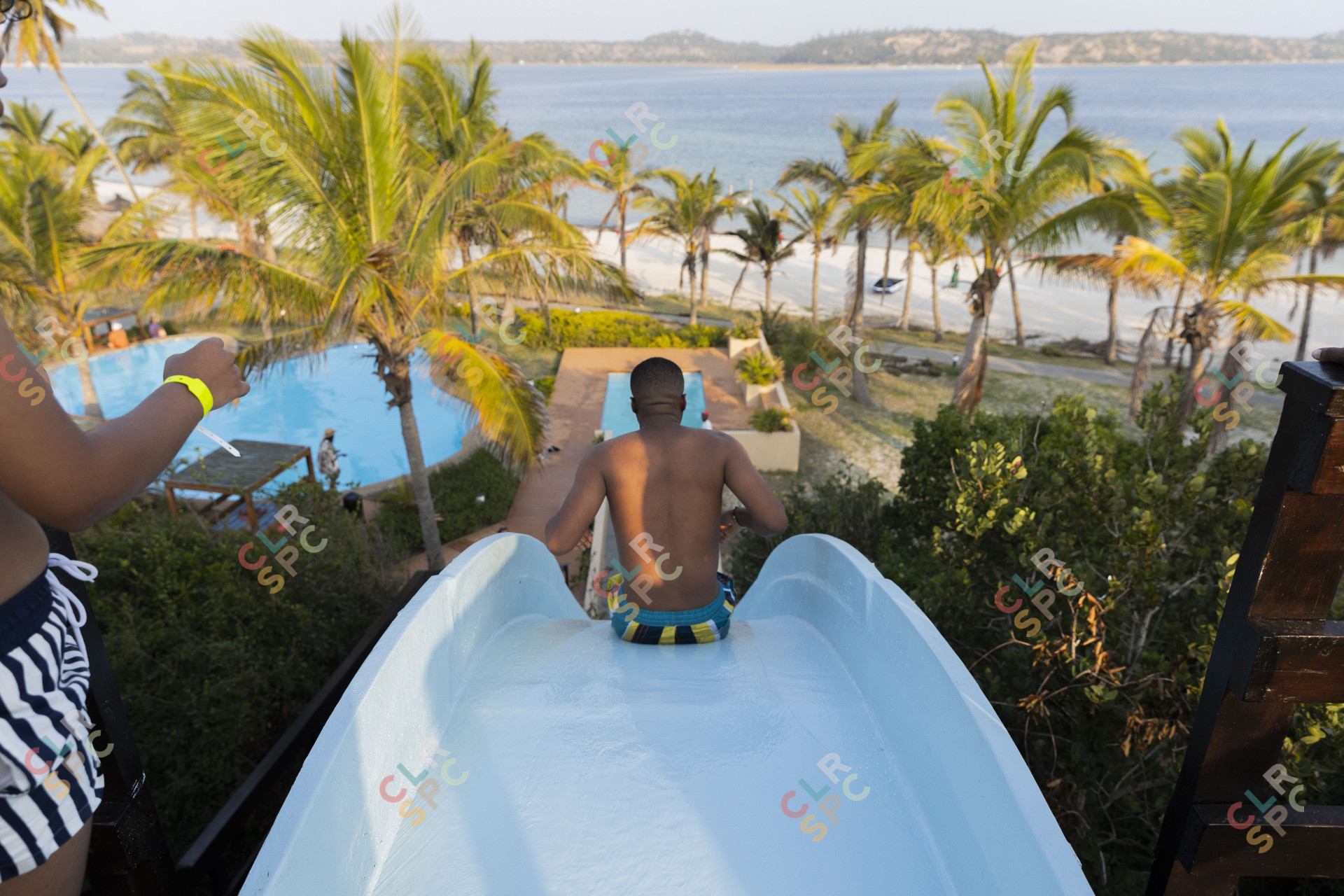 Going down a water slide in Mozambique.