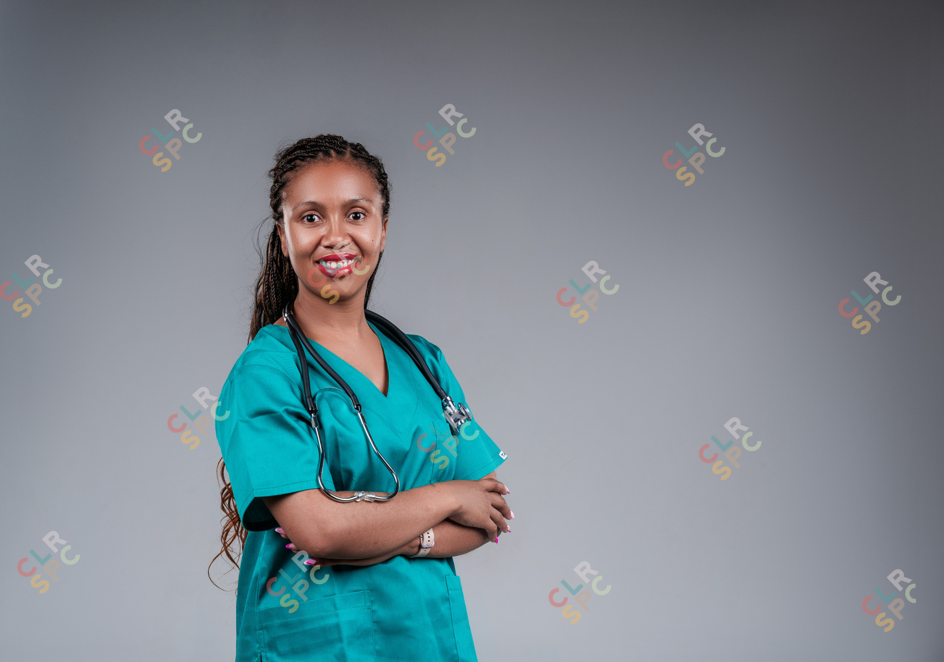 Young African female doctor posting confidently wearing stethoscope.