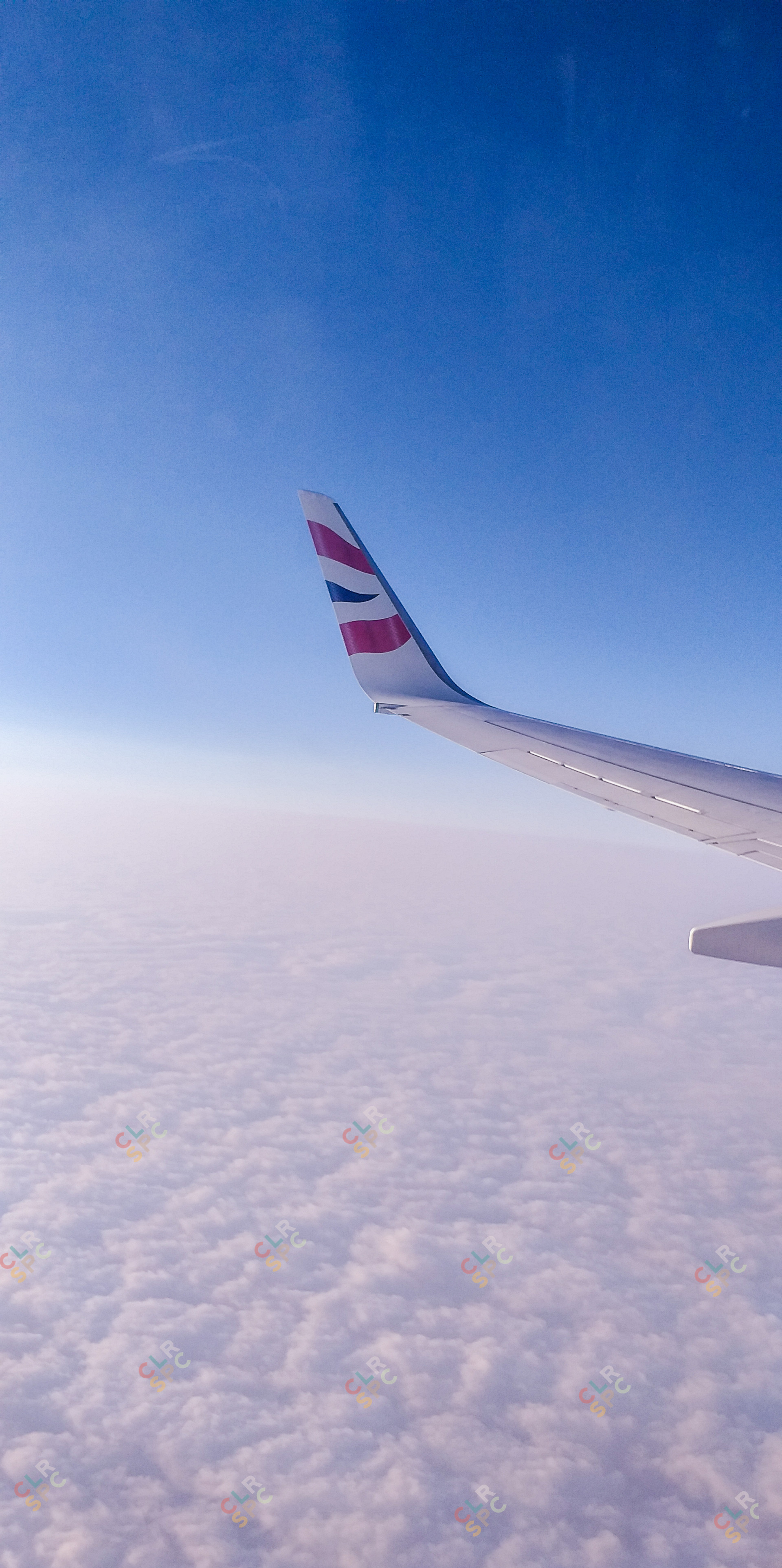 Airplane wing in the sky