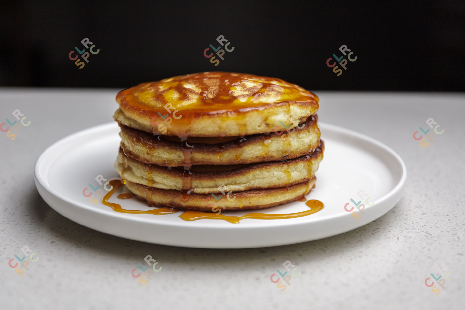 Pancakes with syrup on a plate