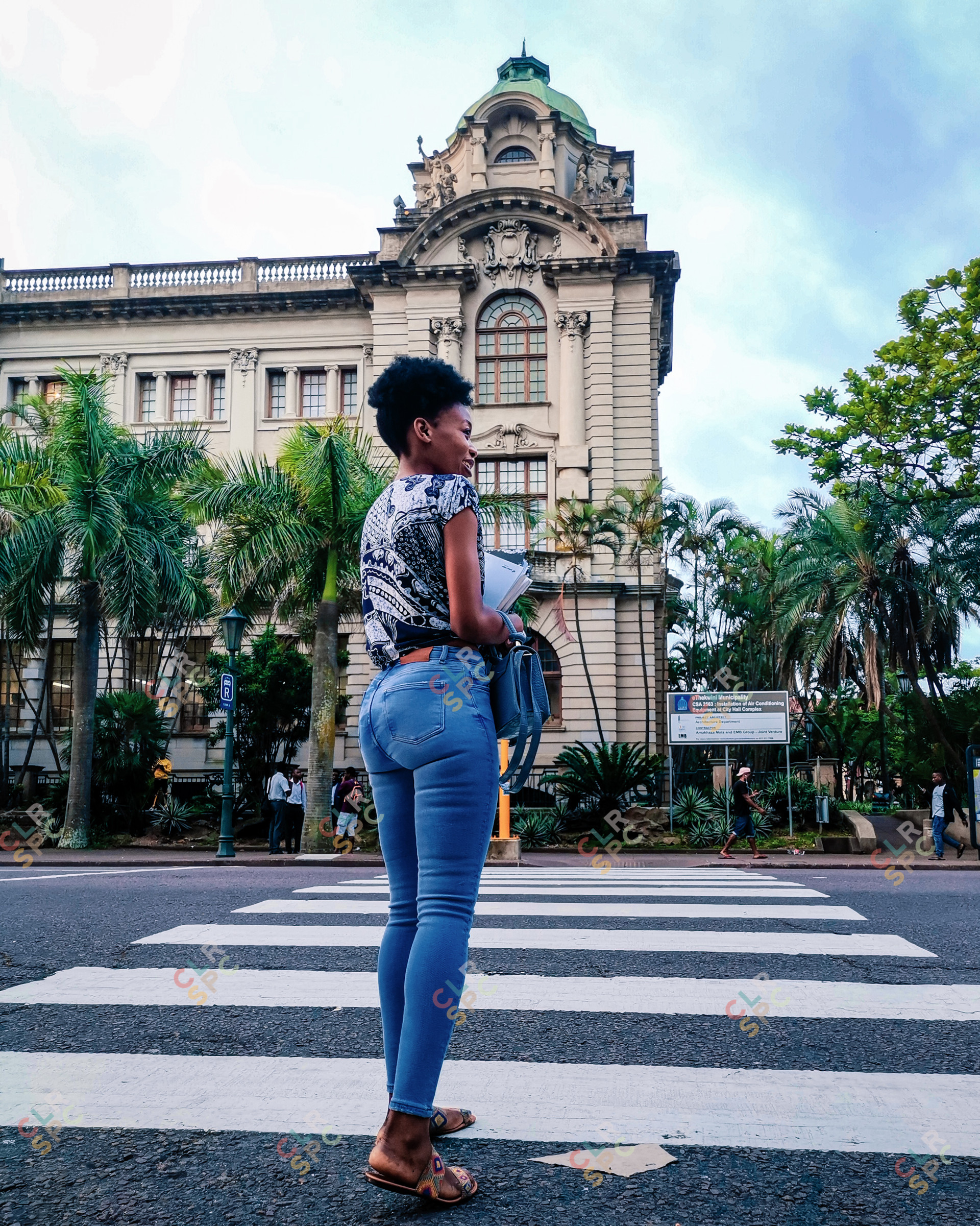 Black girl crossing the road