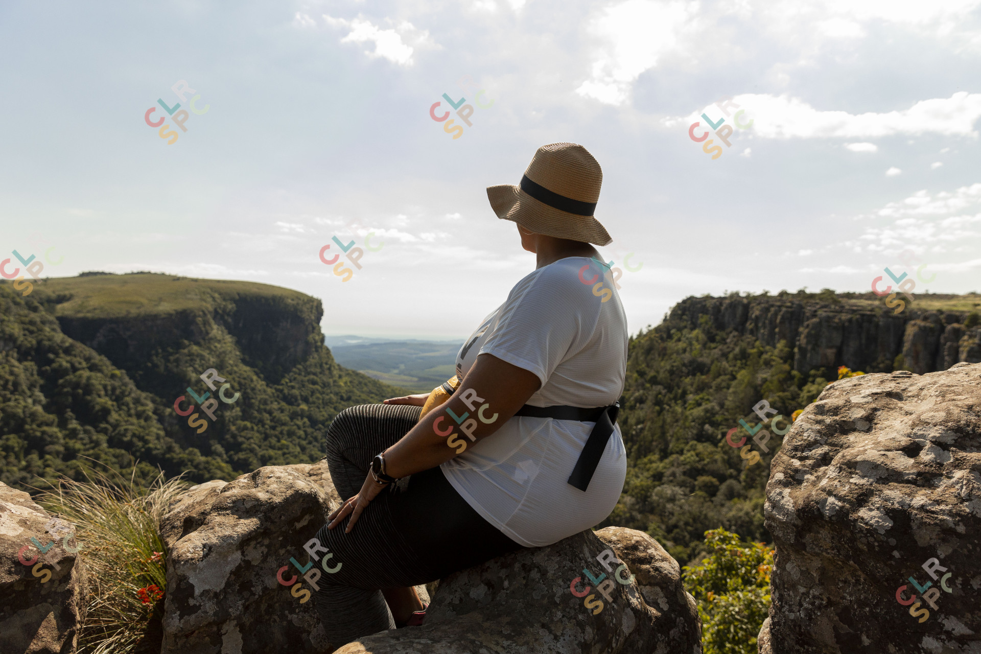 Black woman watching the views of Mpumalanga