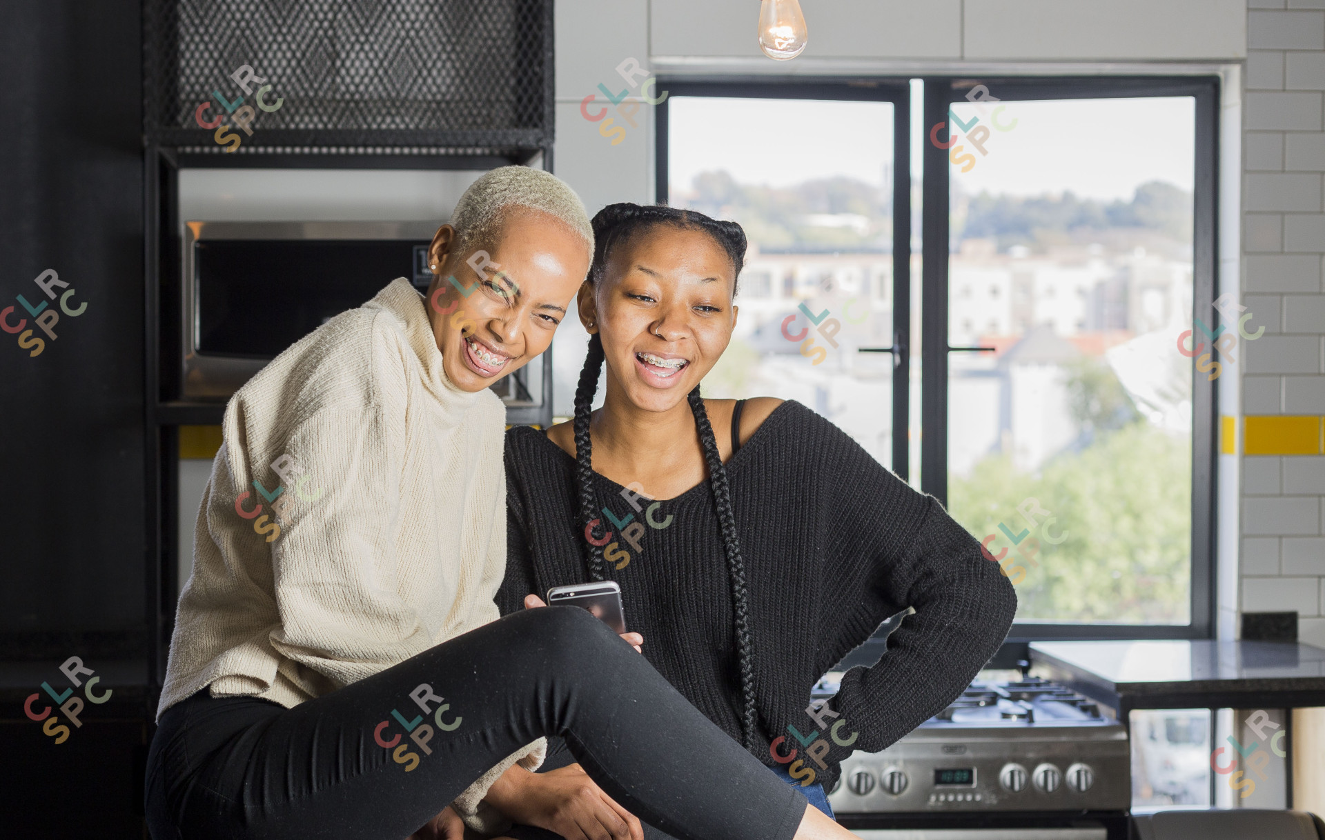 Black woman students laughing