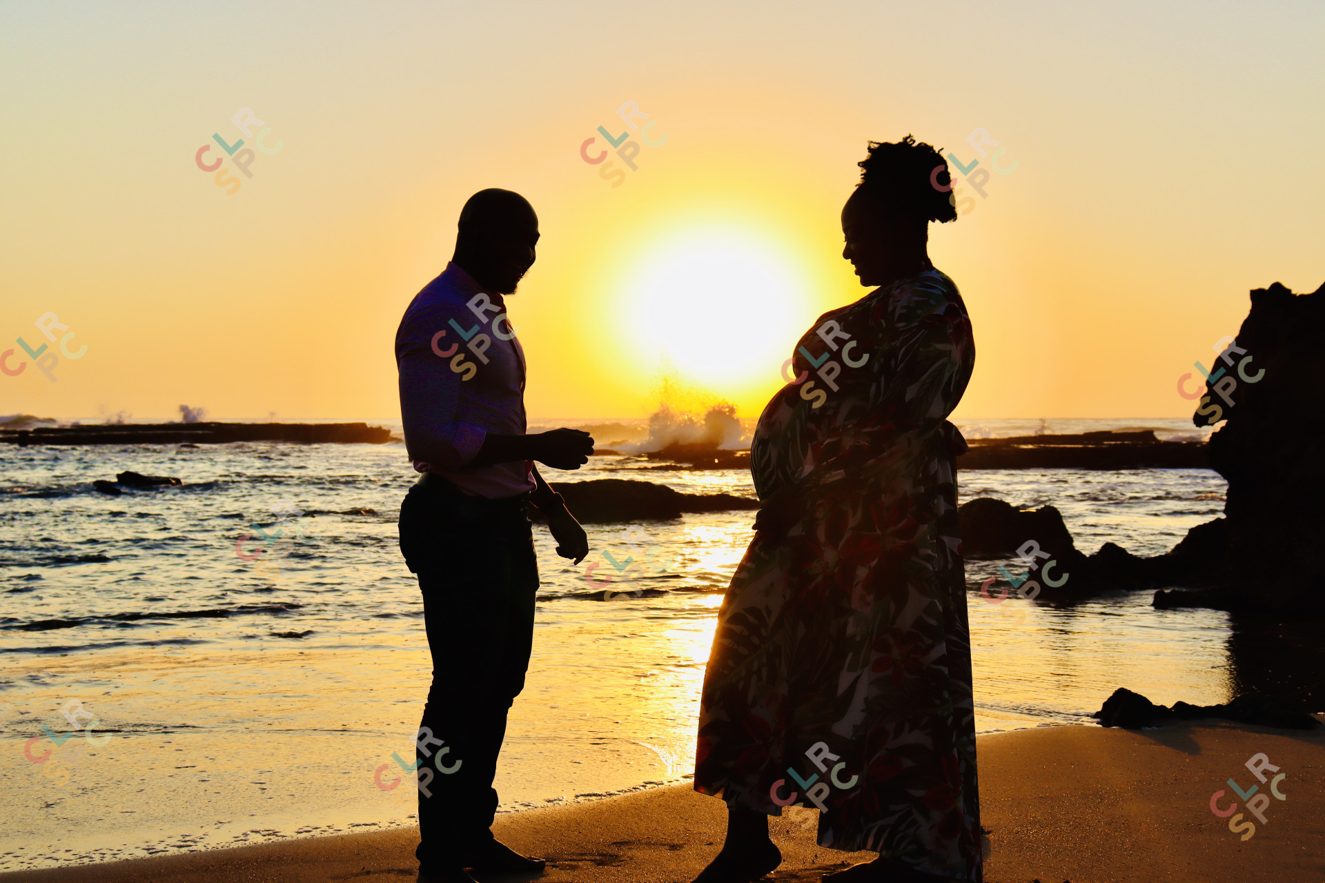 Sunrise maternity couple